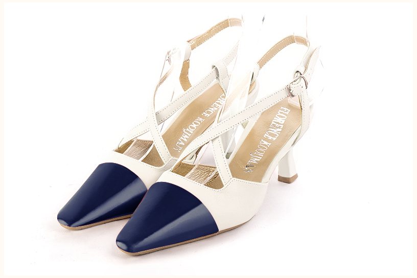Prussian blue and off white women's open back shoes, with crossed straps. Tapered toe. Medium spool heels. Front view - Florence KOOIJMAN
